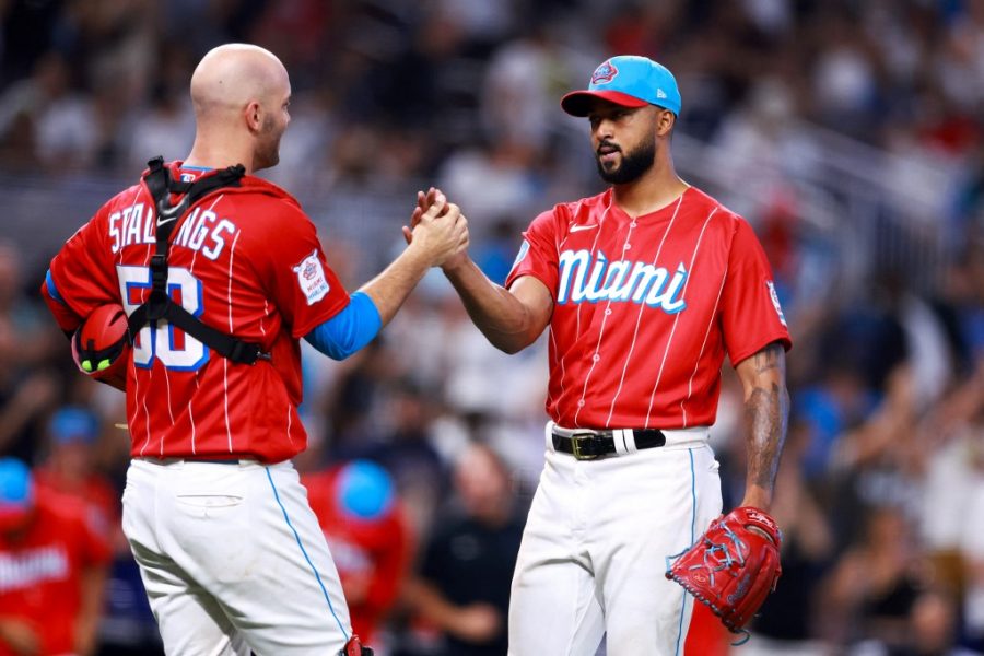 MIAMI, FLORIDA - AUGUST 12: Jacob Stallings #58 and Sandy Alcantara #22 of the Miami Marlins shake hands after defeating the New York Yankees at loanDepot park on August 12, 2023 in Miami, Florida.   Megan Briggs/Getty Images/AFP (Photo by Megan Briggs / GETTY IMAGES NORTH AMERICA / Getty Images via AFP)
